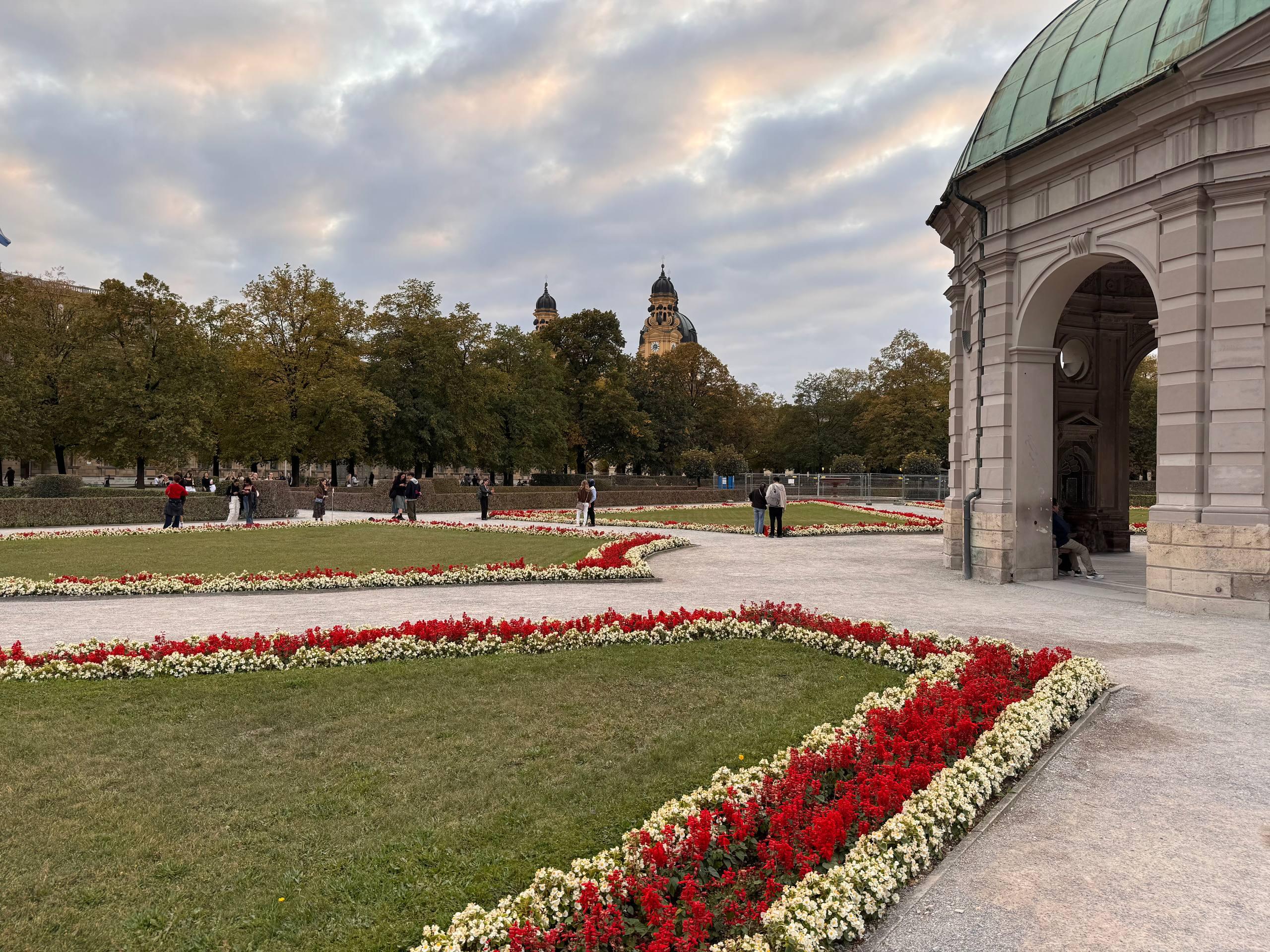 Flowerbeds in the Hofgarten in Munich, with the towers of the Theatinerkirche visible in the background