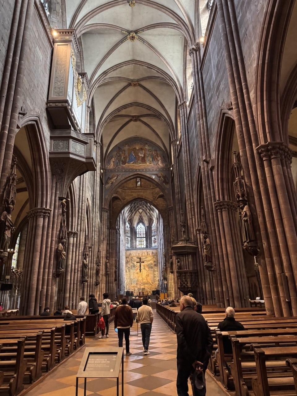Interior of Freiburg Minster, looking down the nave toward the altar